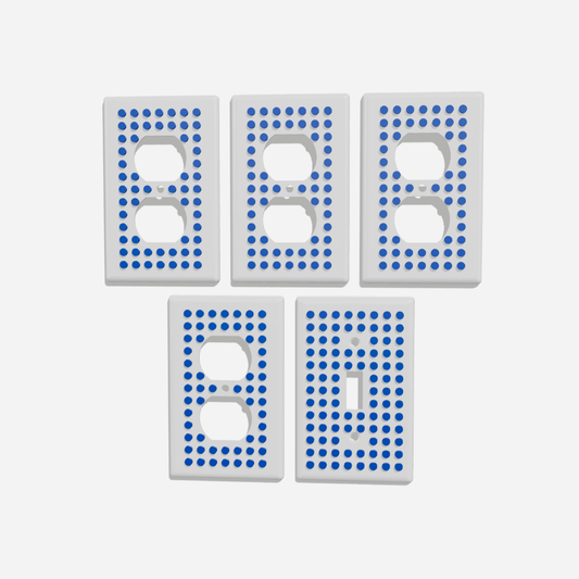 Five brick-compatible wall plates in white with blue studs